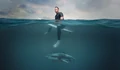 Фоновый кадр с франшизы Акулий пляж с Крисом Хемсвортом